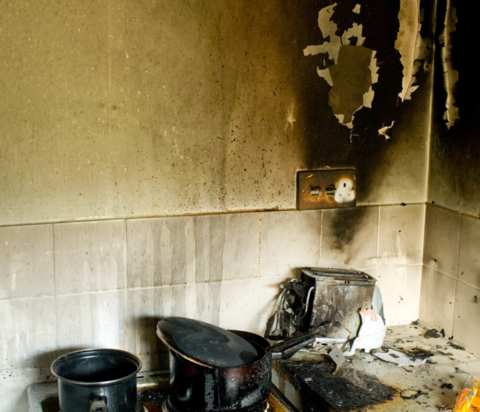 image of kitchen with fire damage